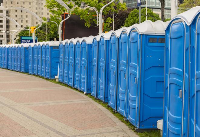 a row of sleek and modern portable restrooms at a special outdoor event in Dearing GA